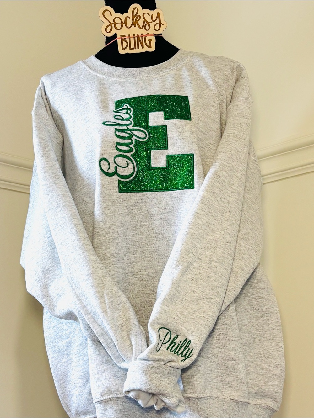 Green 'E' and Eagles Script on Sweatshirt